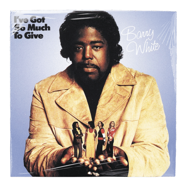 Album cover of Barry White's "I've Got So Much to Give," featuring Barry White holding miniature figures while wearing a stylish beige coat. The design reflects the soulful essence of his music.